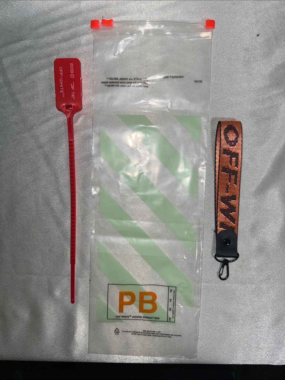 Off-White Red Zip Tie and Orange Logo Wrist Strap Phone Accessory Set🔥New!